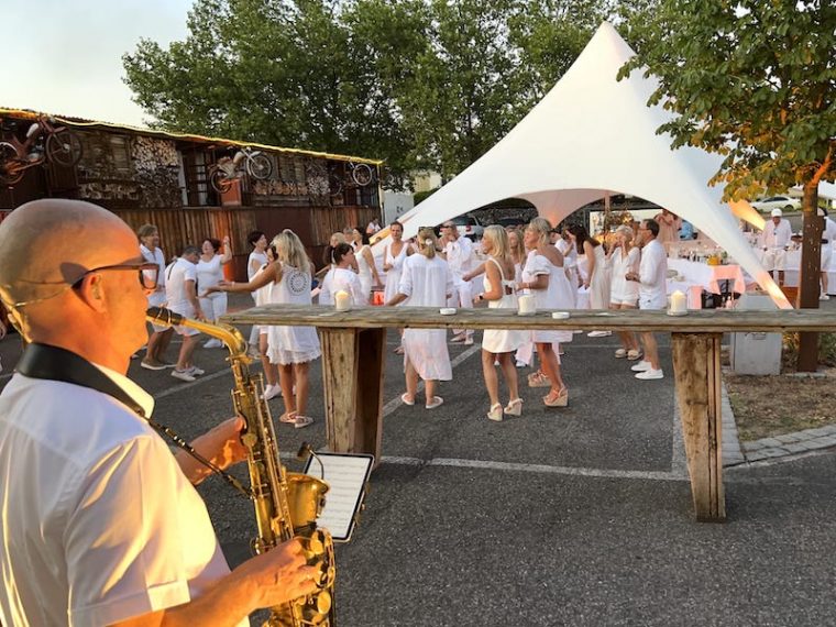 white summer dance with saxophone player